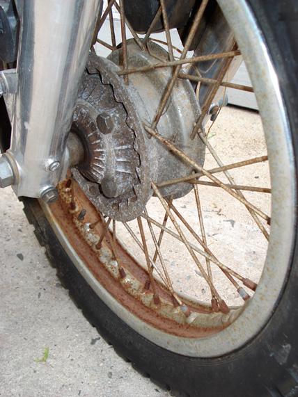 duc__rusted_front_wheel_close_up